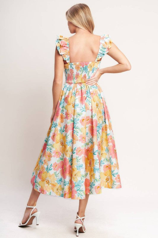 Vestido midi floral, escote corazón. 100% algodón.