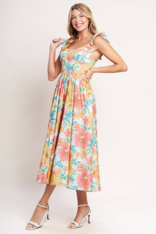 Vestido midi floral, escote corazón. 100% algodón.