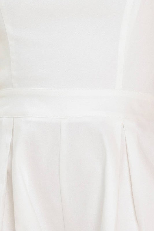 Romper marfil con contraste en dobladillo