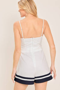 Romper marfil con contraste en dobladillo