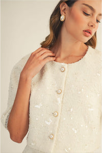 Set blanco tweed con lentejuelas y shorts